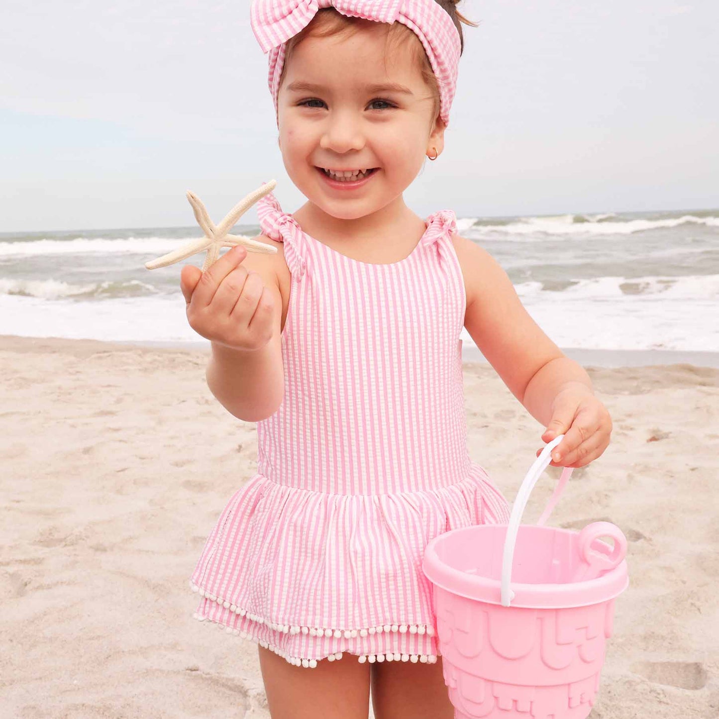 Tiered Skirt with White Pom Trim | Best Sellers